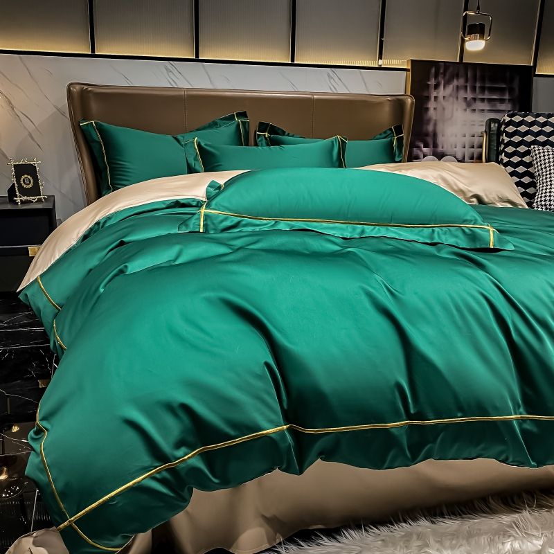 zoom de la parure de lit de luxe vert émeraude et ligne dorée en pur coton Égyptien