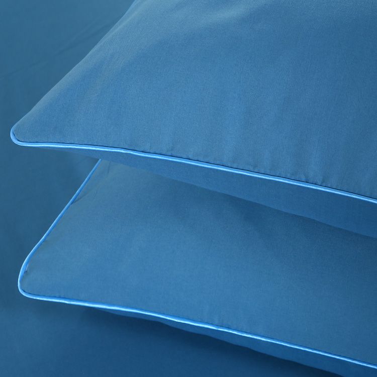 Housse de couette bleue unie