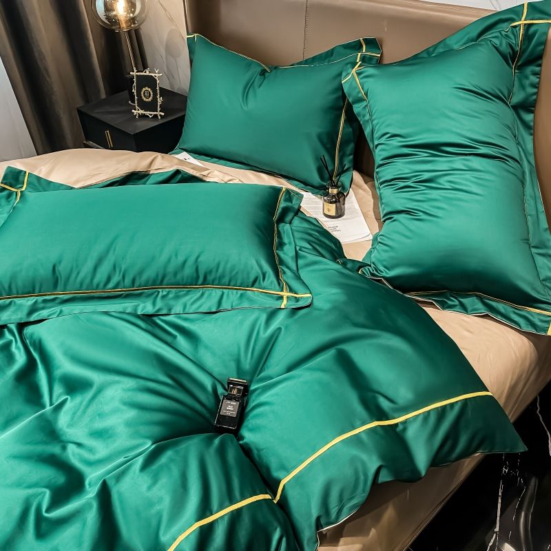 vue coté de la parure de lit de luxe vert émeraude et ligne dorée en pur coton Égyptien