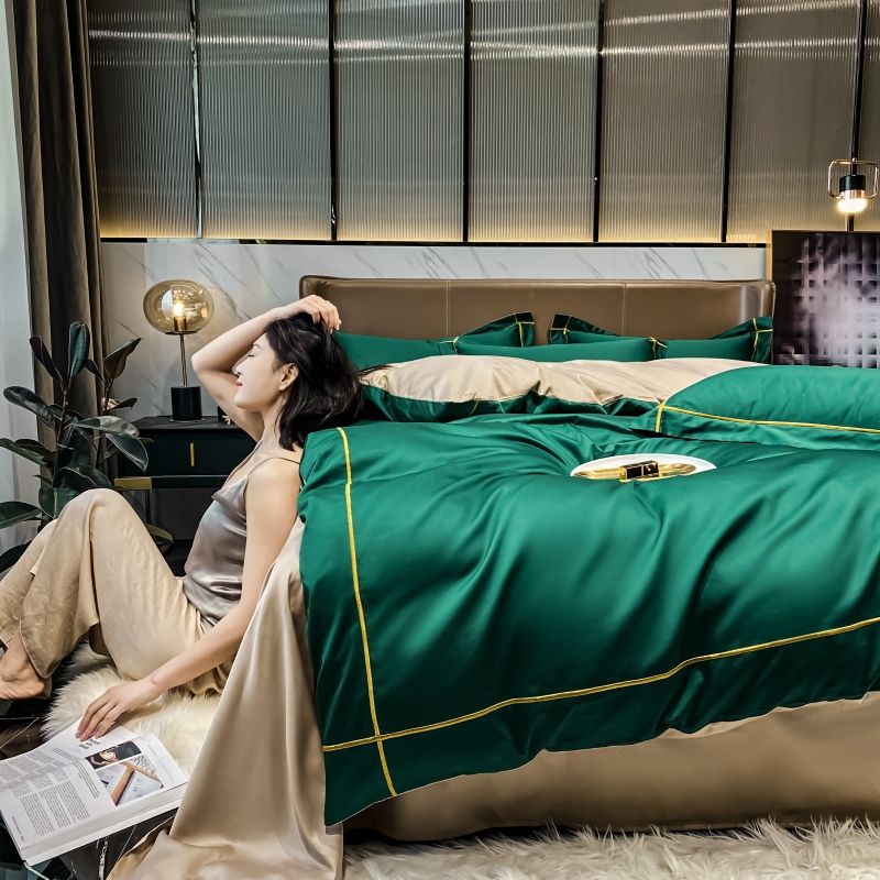 femme assis de la parure de lit de luxe vert émeraude et ligne dorée en pur coton Égyptien