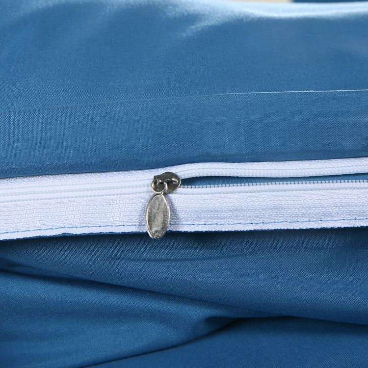 Housse de couette bleue unie