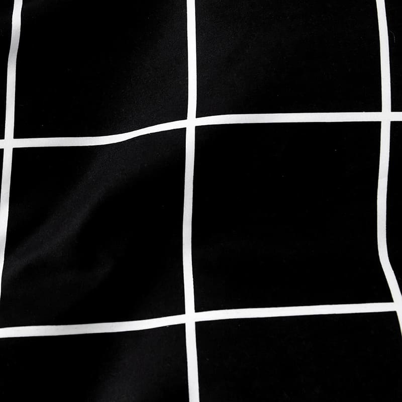 Parure de lit noir à carreaux blancs