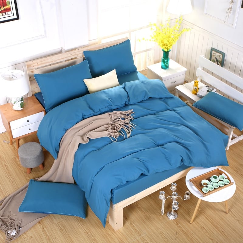 Housse de couette bleue unie