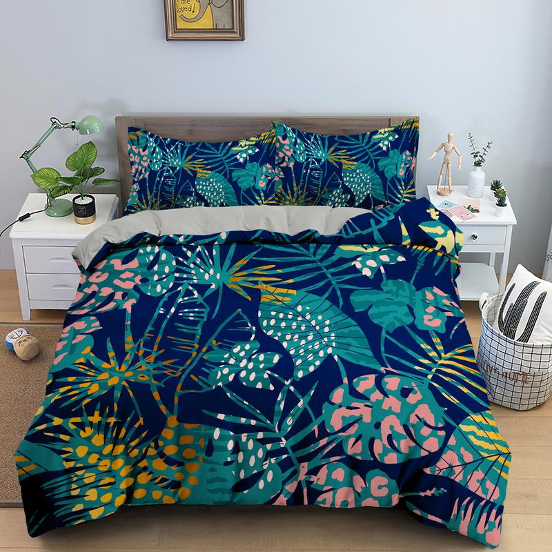Parure de lit bleu à motif feuilles tropical