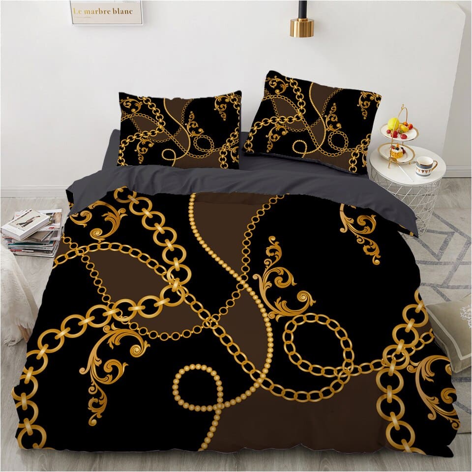 Parure de lit noir et motif baroque doré