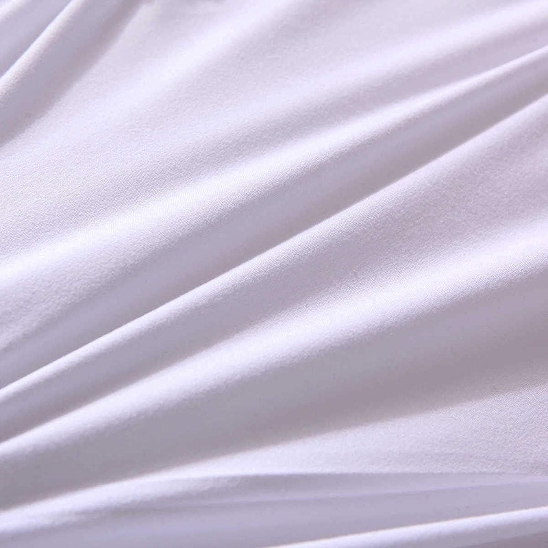 Parure de lit blanche à pli de luxe dessous